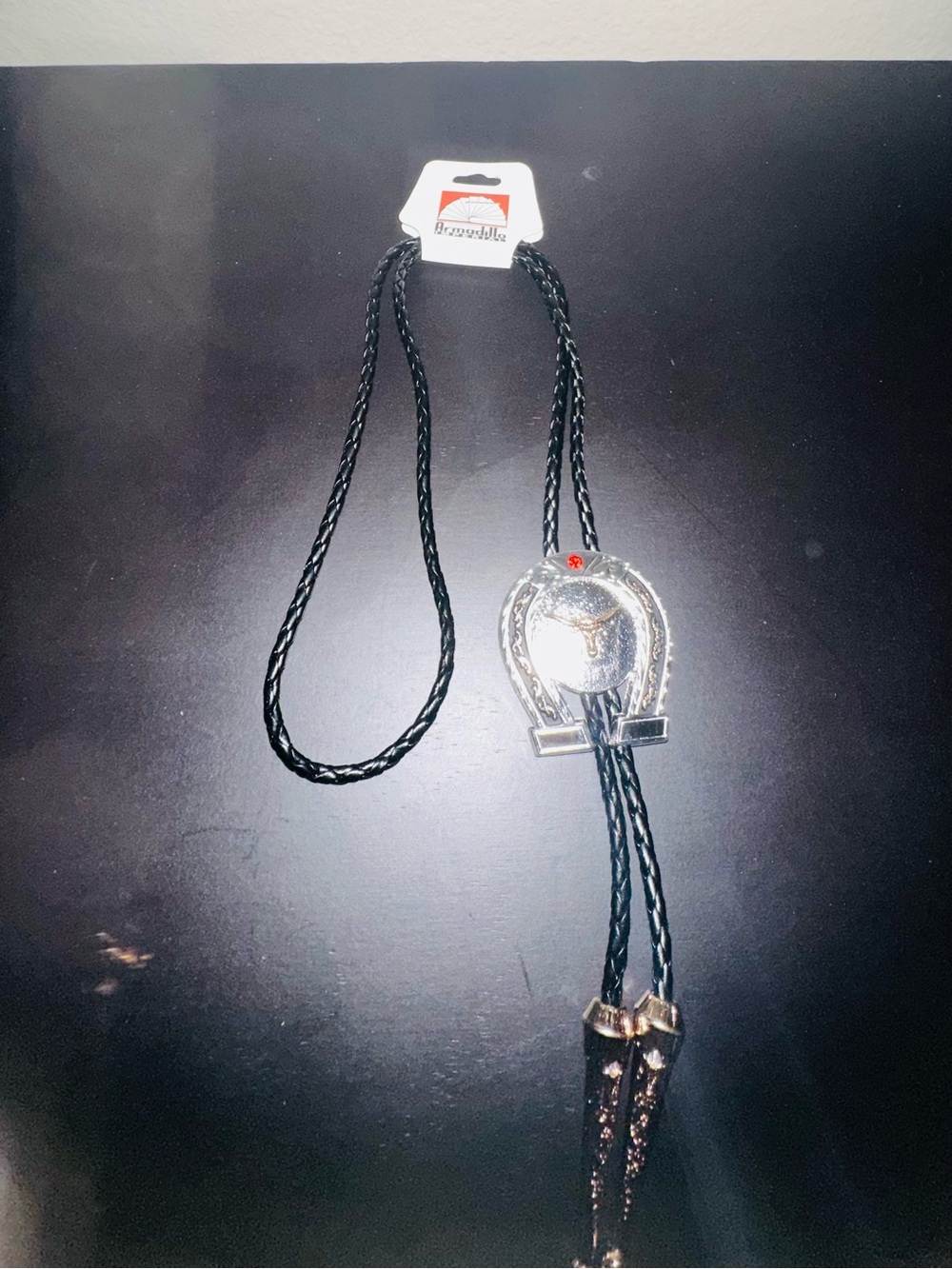 Silver and Black Bolo Tie with Western Medallion
